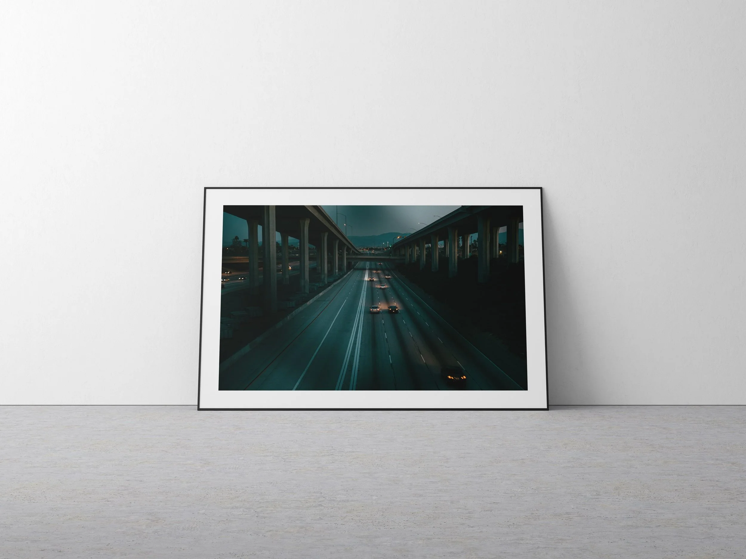 This photograph was taken at about 530am. It was one of those shots that reminded me a of a cinematic scene out of movie. It&rsquo; was quiet and the cars driving by had this subtle sound similar to when you hear the waves at the beach. I have a fasc