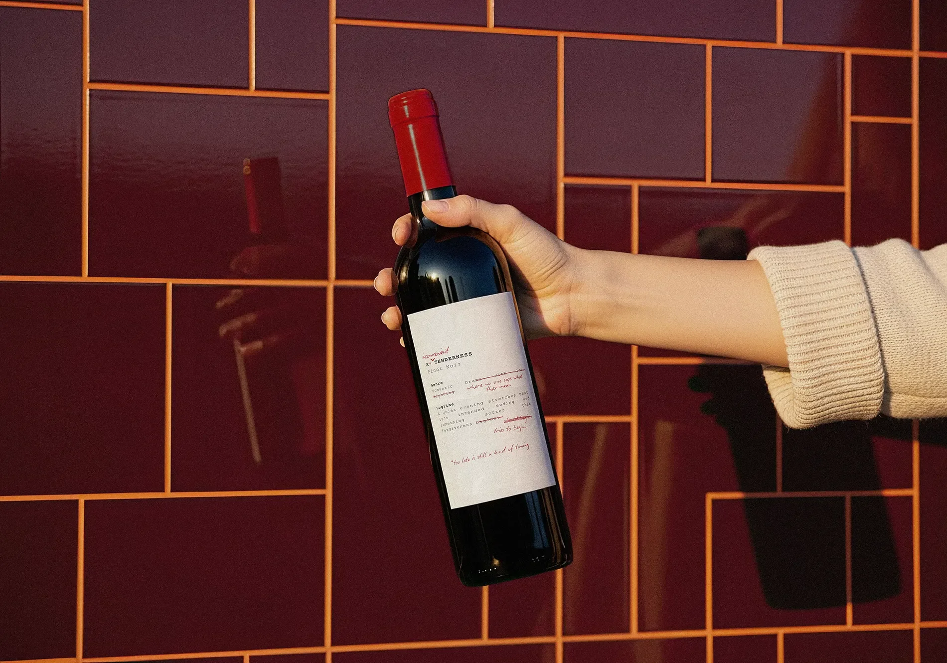 HOLDING BOTTLE RED copy.webp