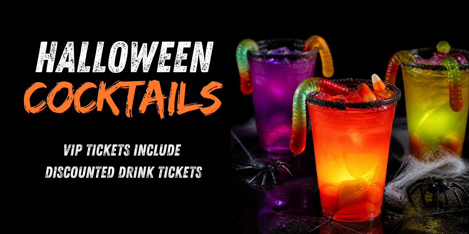 Colorful Halloween-themed cocktails in illuminated glasses with gummy worms and candy corn, surrounded by fake spider webs and spiders.