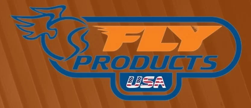 Fly Products USA logo with a stylized eagle in flight, set against a wooden background.