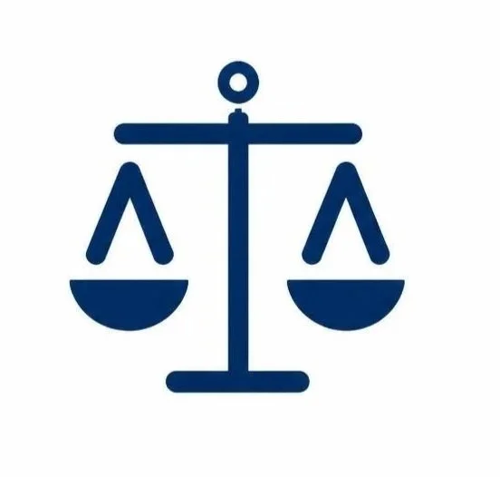 Icon of a balance scale with a circle at the top, symbolizing justice or fairness.
