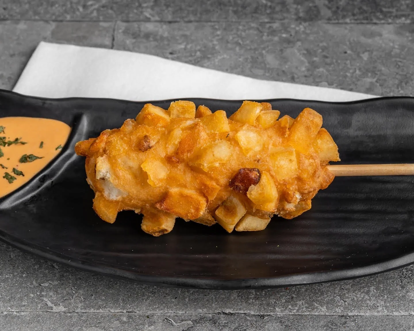 Korean potato corn dog at The Crew Korean Restaurant in San Francisco’s Sunset District.