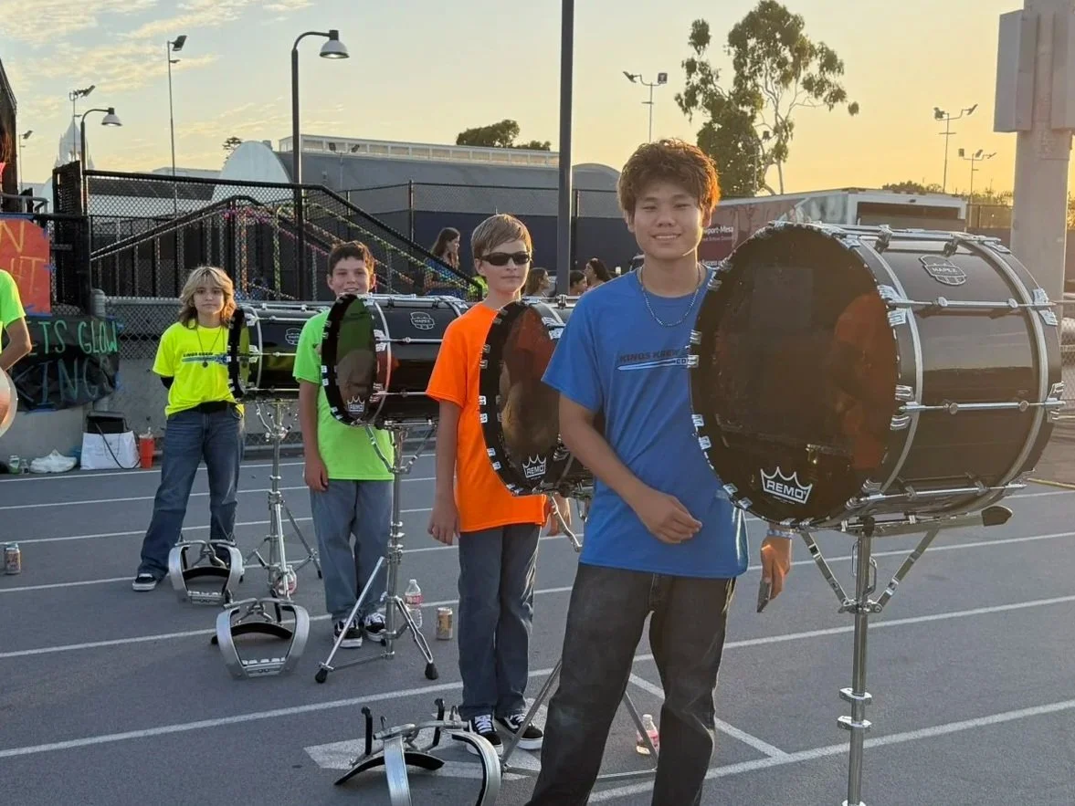 The bass line of the CdM Drumline performing at the first home football game of 2026.