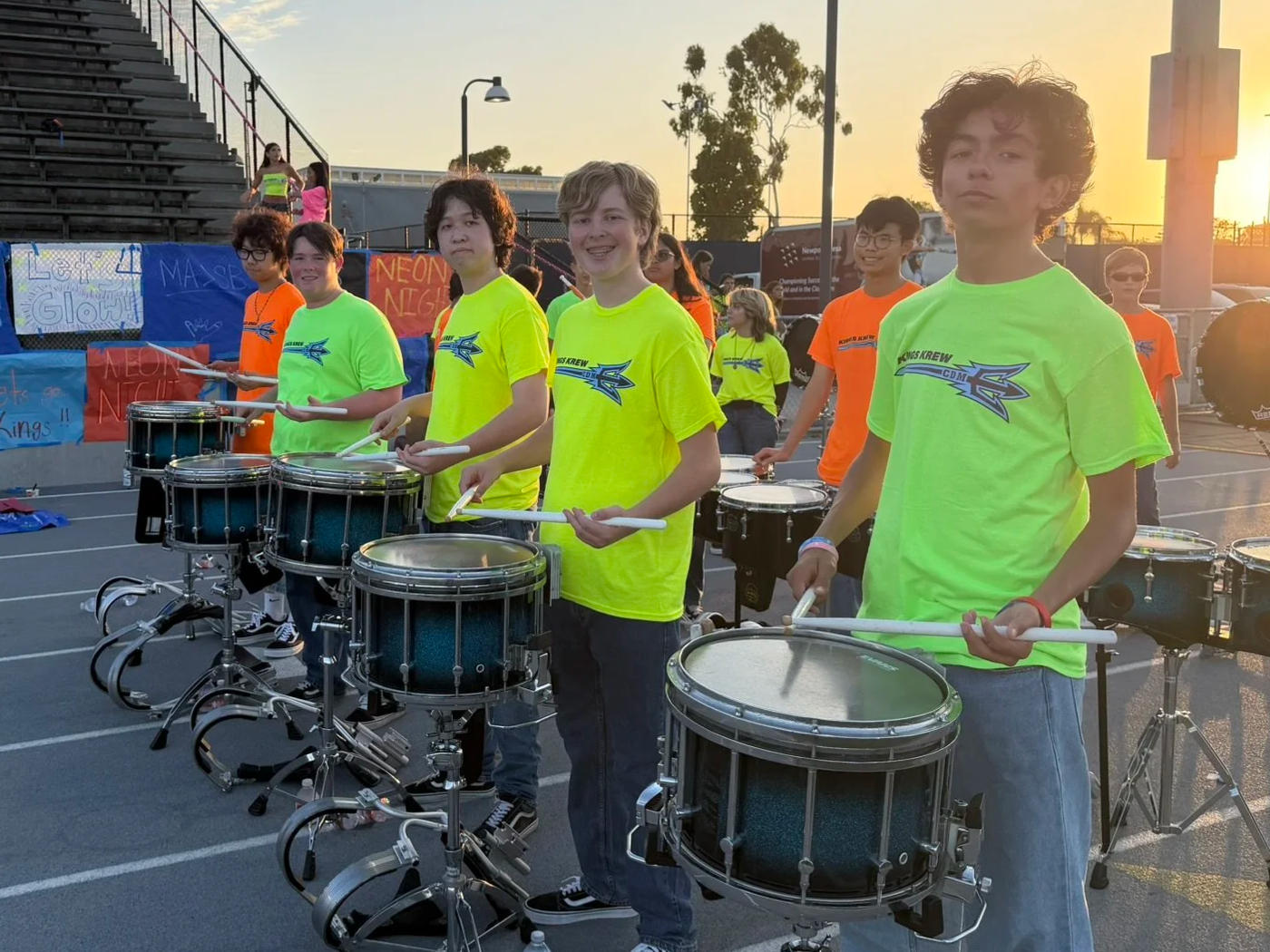 The snare line of the CdM Drumline performing at the first home football game of 2026.