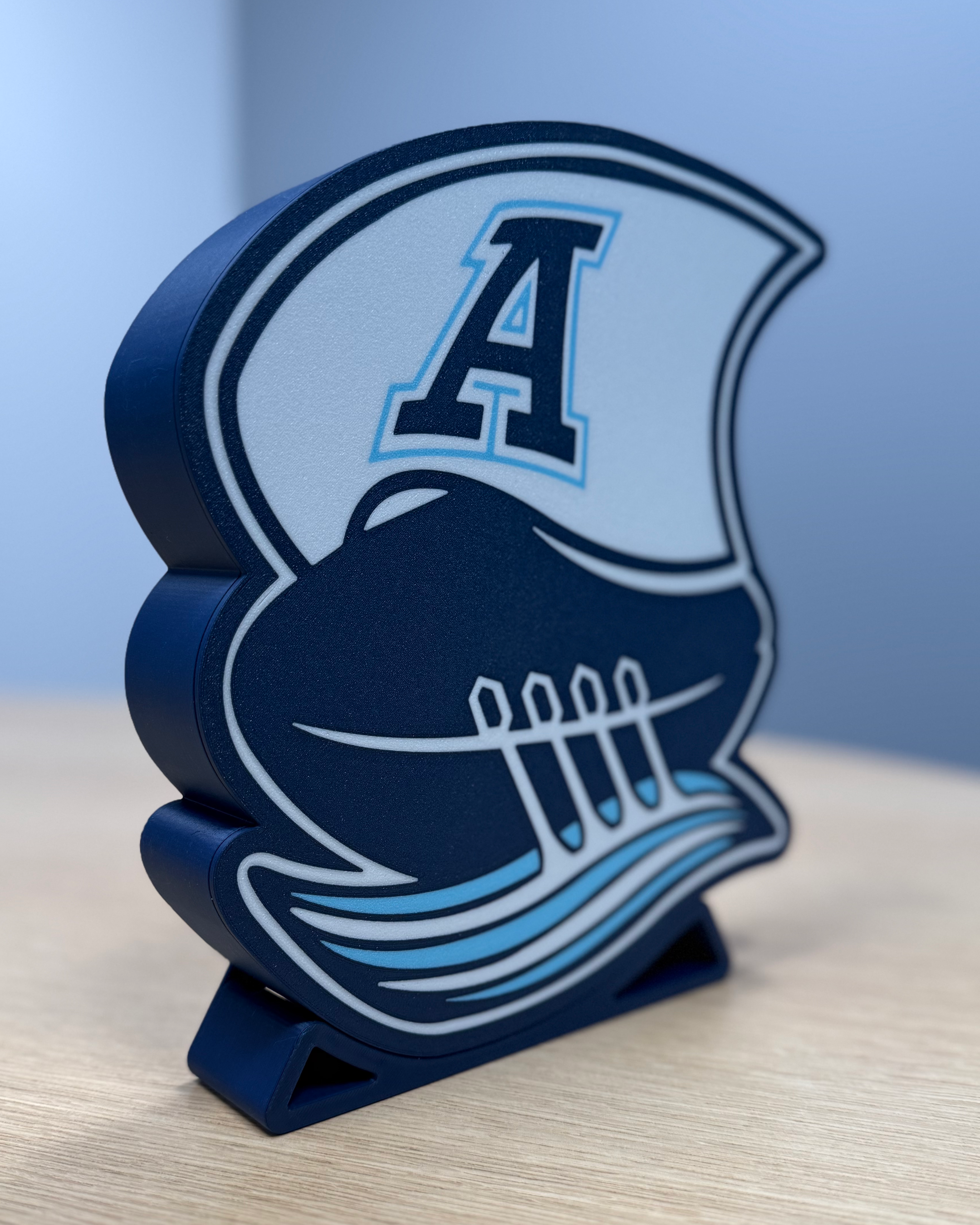 Angled view of the Toronto Argonauts lightbox showing the depth of the 3D-printed housing and display stand