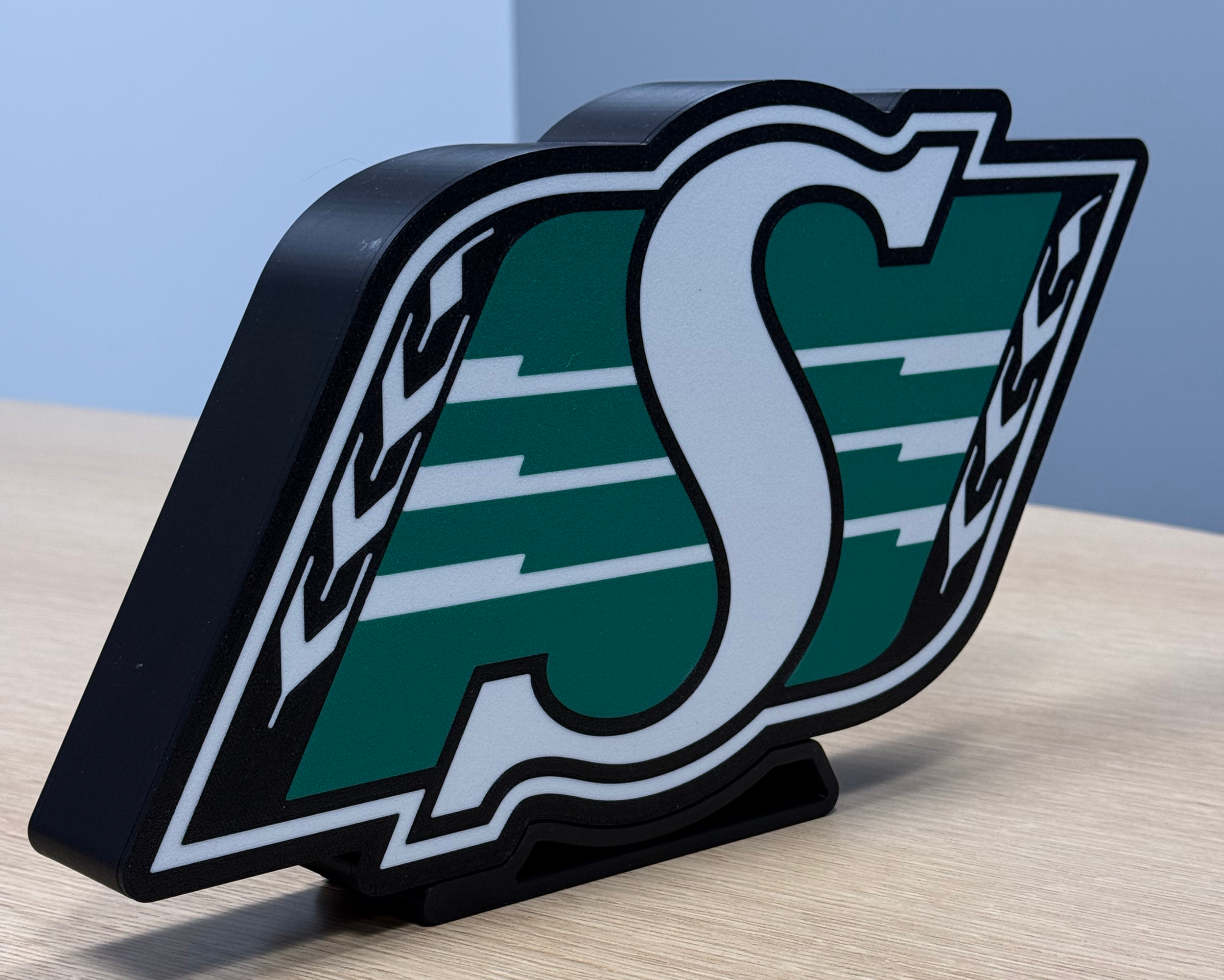 Angled front view of the Saskatchewan Roughriders lightbox showing the depth of the 3D-printed housing