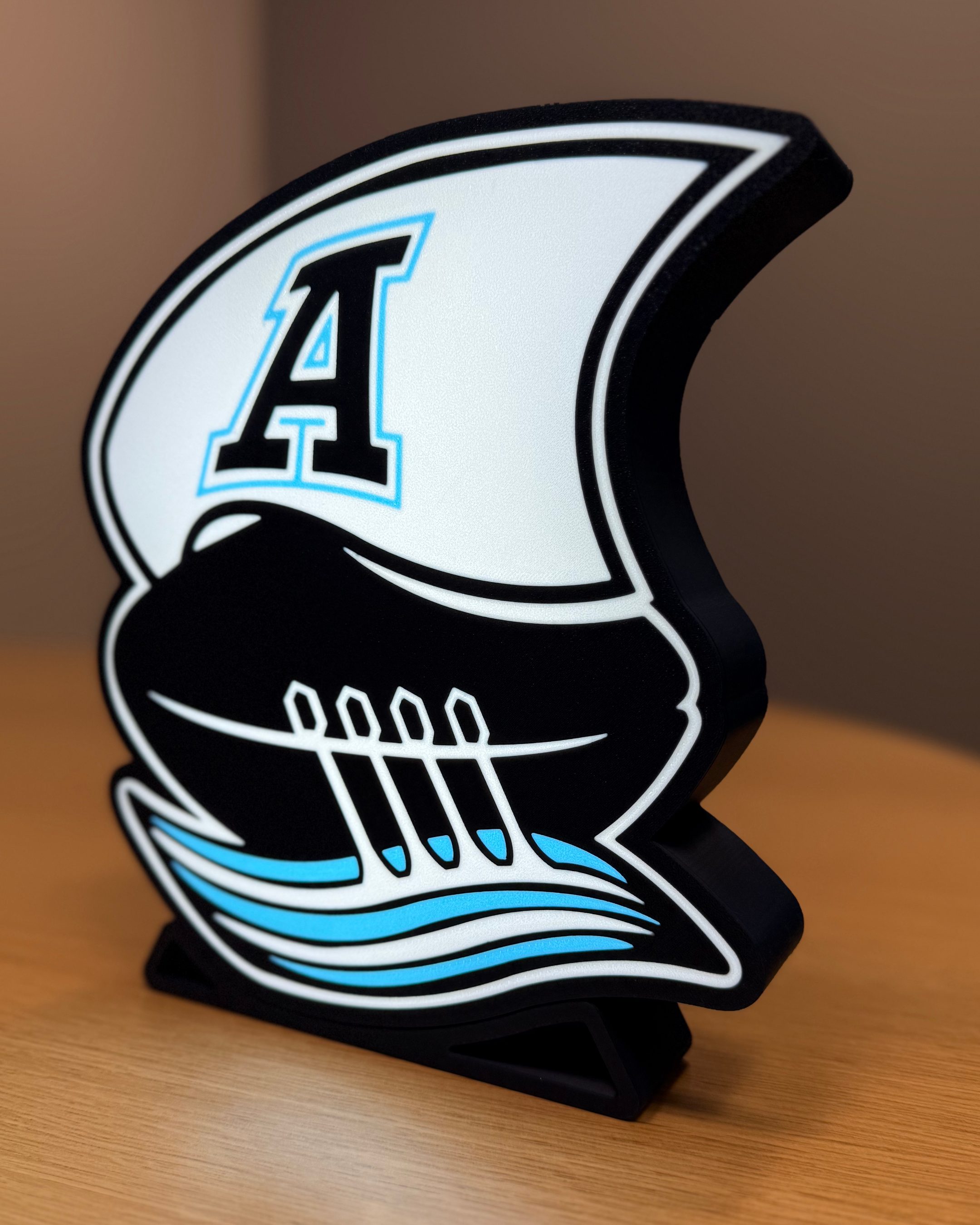 Illuminated angled view of the Toronto Argonauts lightbox with warm ambient lighting