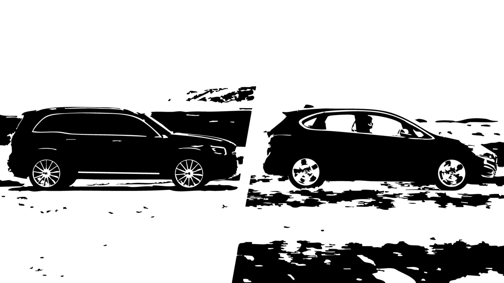 Silhouette of two cars parked on a rocky, uneven terrain against a bright sky.