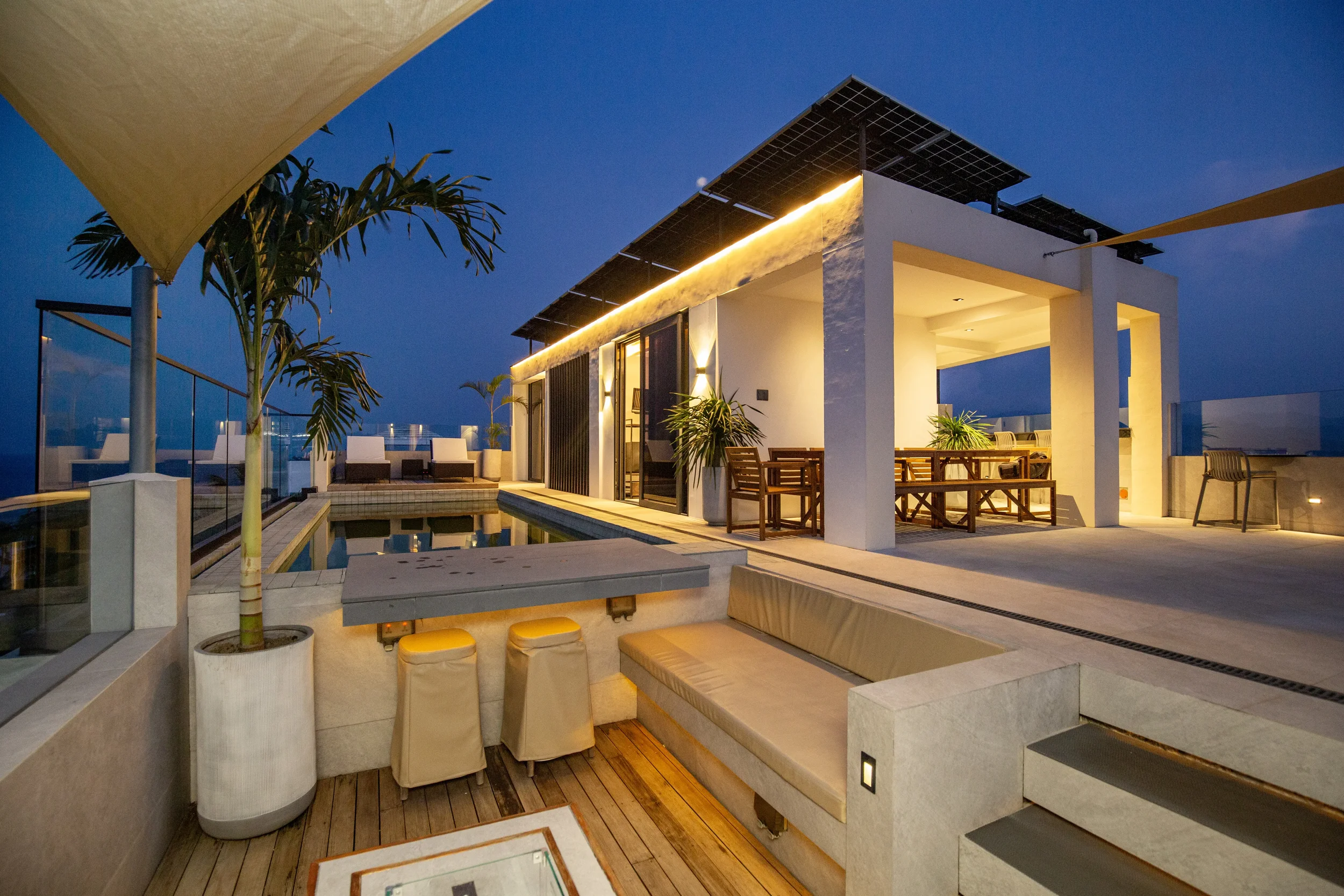 Penthouse Roofdeck at night.webp