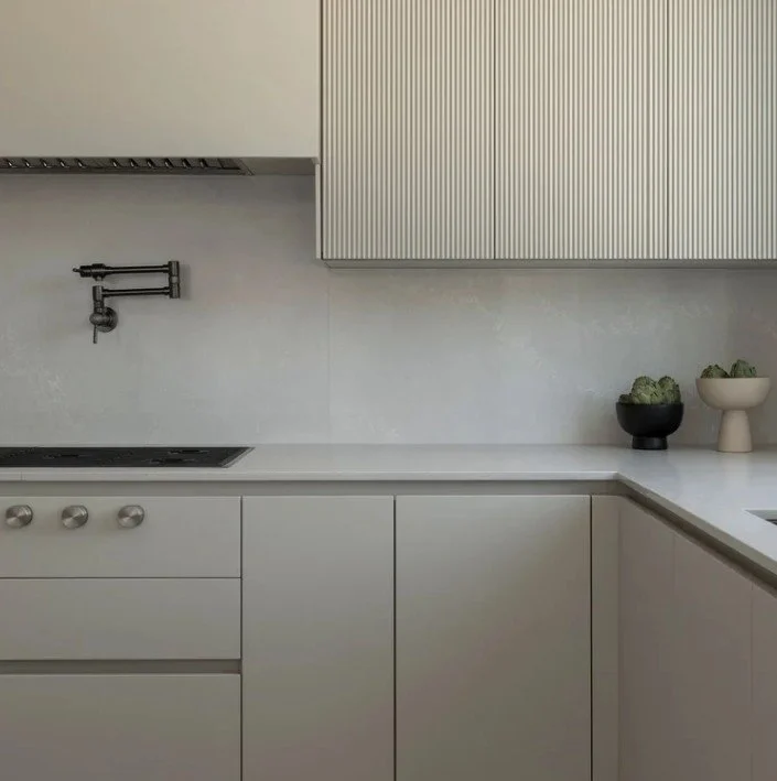 Poggenpohl kitchen with sink and large window in the Eton residence by Chrome Design in Montreal