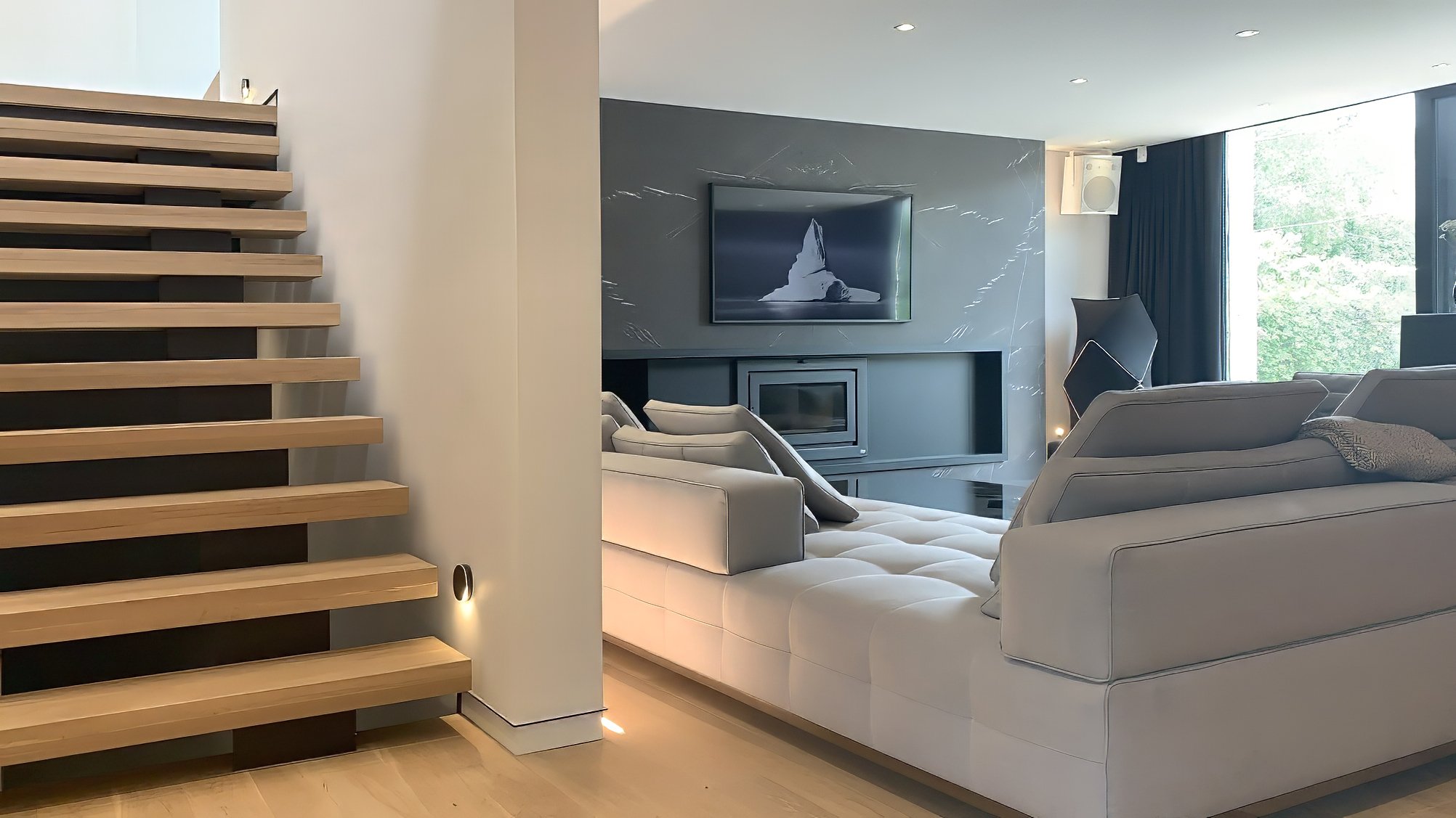 Lazard living room and open staircase by Chrome Design in Montreal
