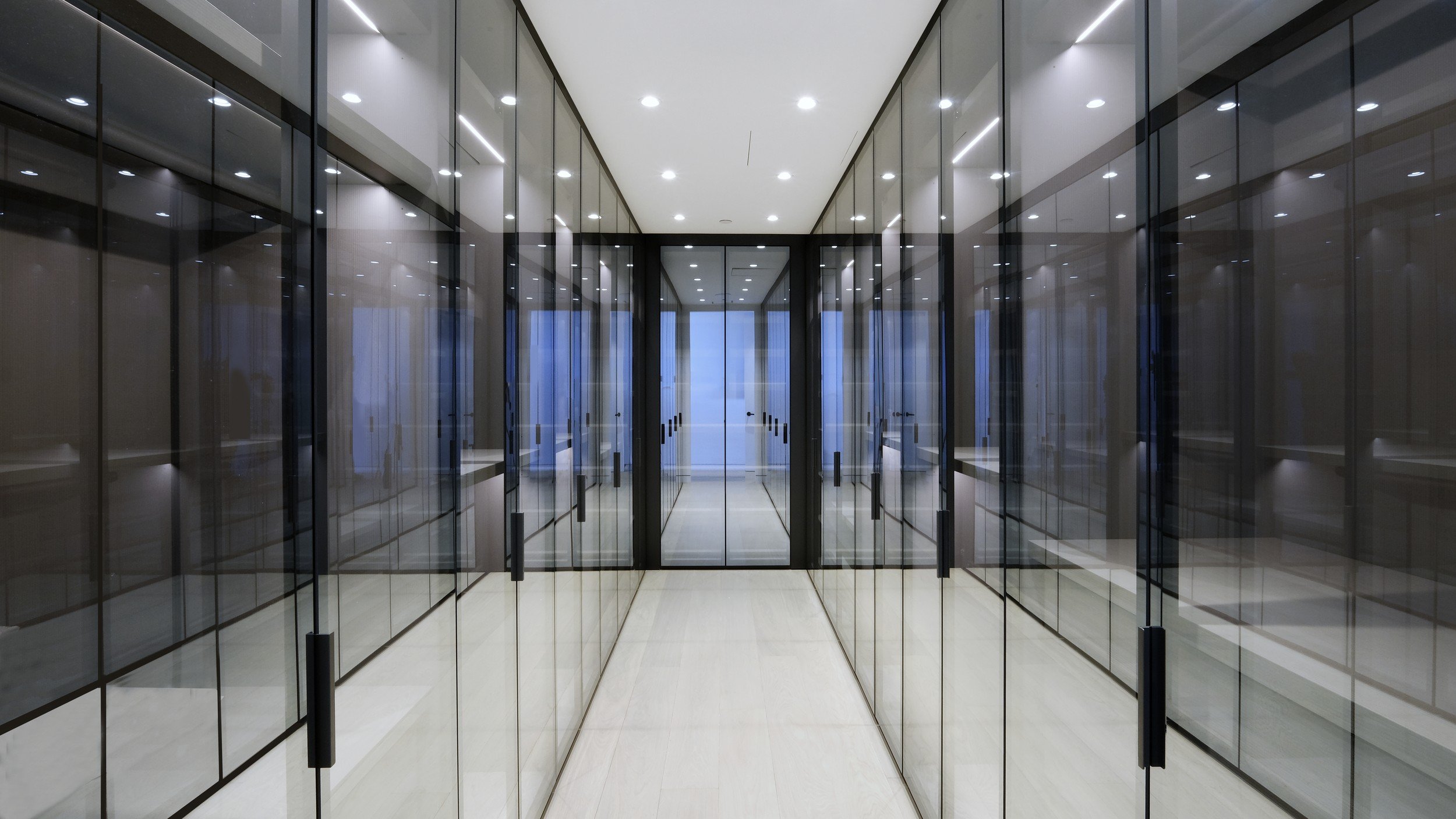 Vanilla Poliform walk-in closet by Chrome Design, a luxury residential interior in Montreal