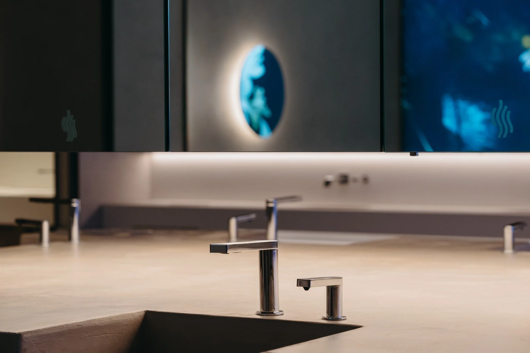 Faucet and basin detail in the inclusive bathroom at Royalmount in Montreal by Chrome Design and Borrallo Interiors
