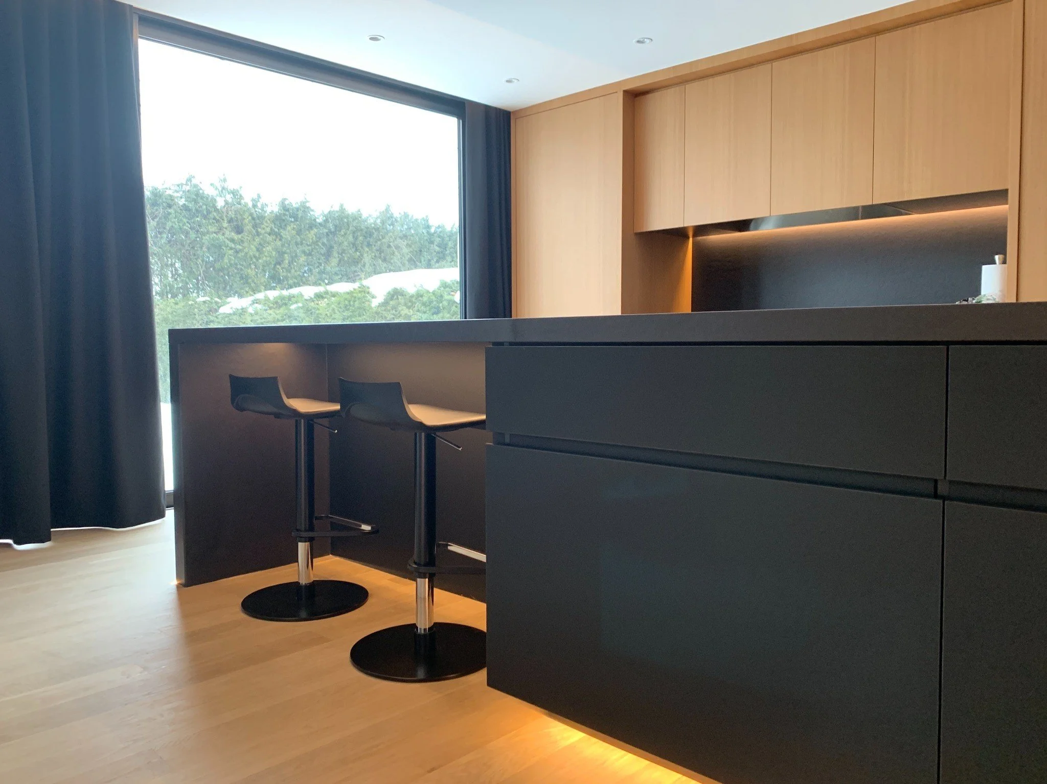 Custom kitchen island in the Lazard residence by Chrome Design in Montreal