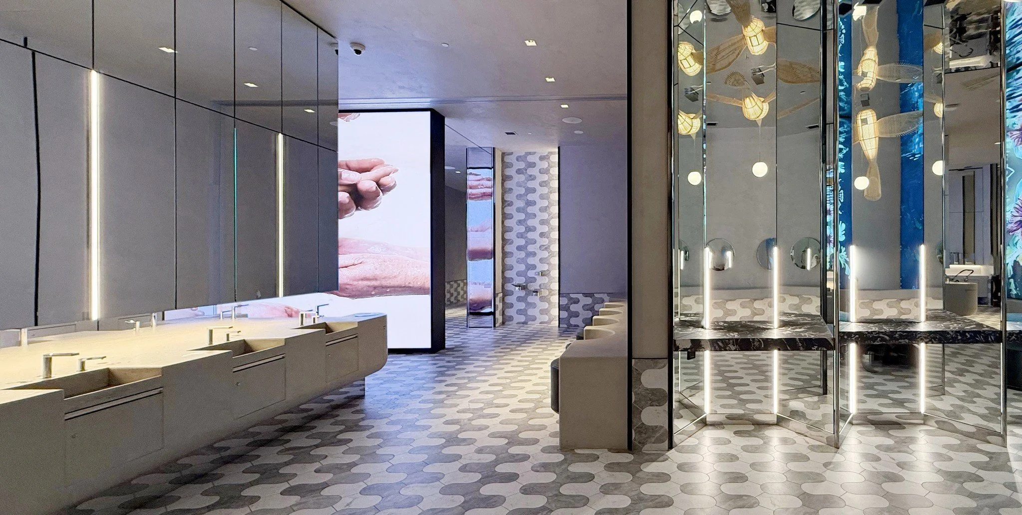 Mirrored vanity area in the inclusive bathroom at Royalmount in Montreal by Chrome Design and Borrallo Interiors