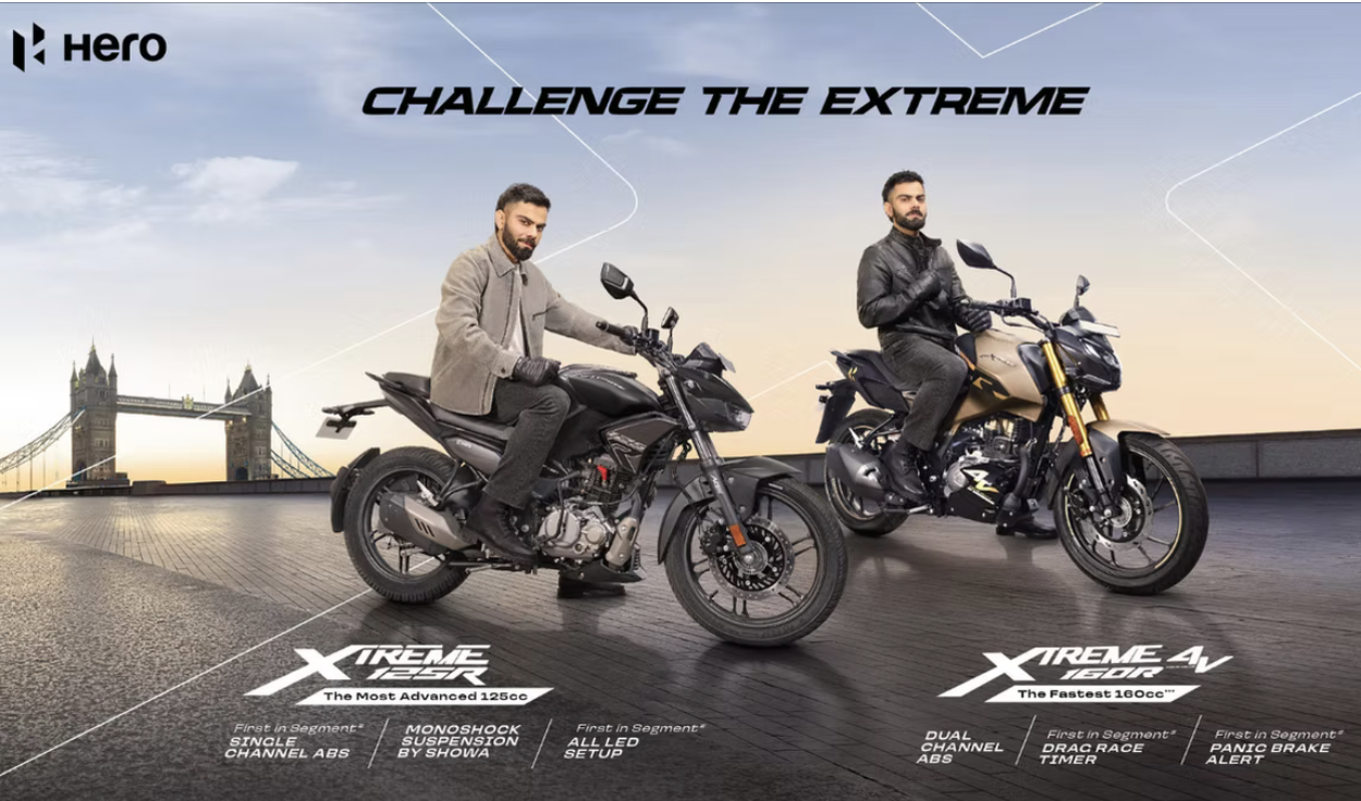 Two men sitting on black and gold motorcycles on a rooftop with the London Bridge in the background. The left motorcycle is labeled 'Xtreme 125R' with features listed, and the right motorcycle is labeled 'Xtreme 4V 160R' with features listed. The sky is clear, and the promotional slogan 'Challenge the Extreme' is at the top.