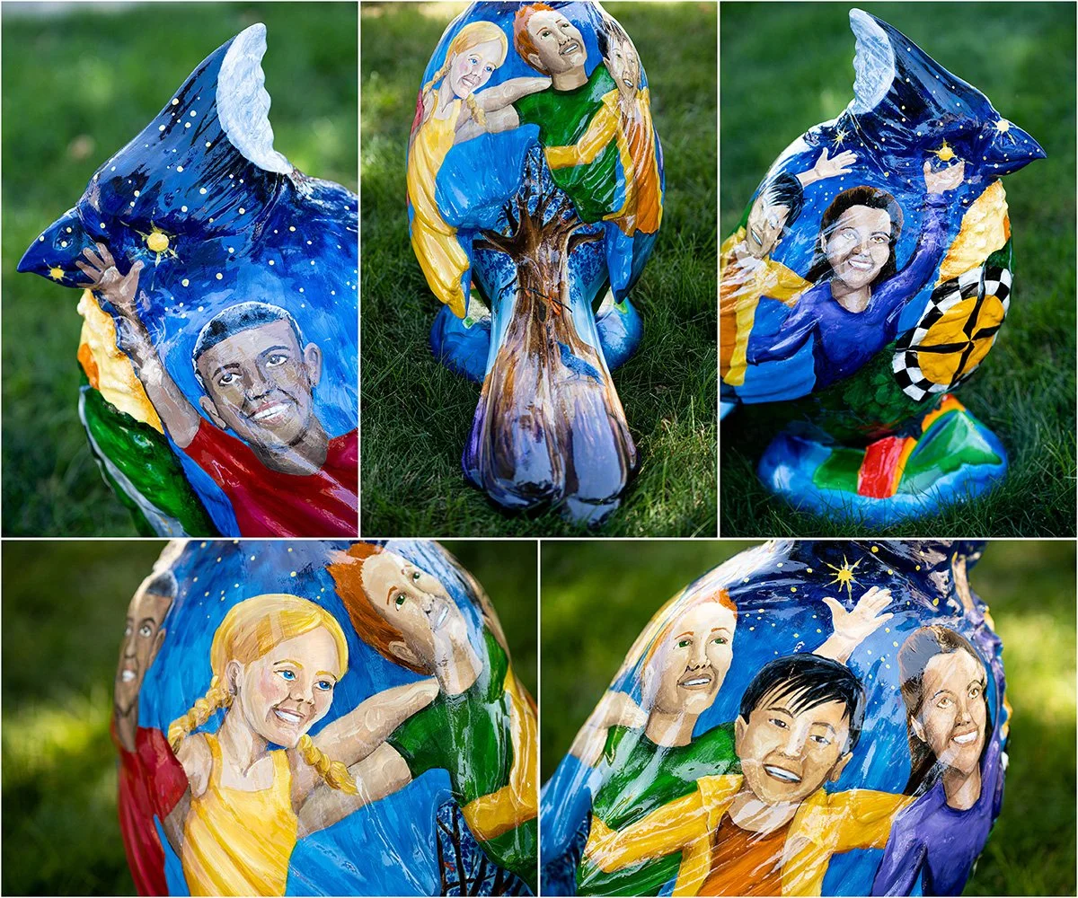 Reaching for the Stars: Created for the Blue River Arts Council’s Birds of a Feather project, this three-foot cardinal celebrates children reaching toward their dreams, with students, stars, and a night sky wrapping around the sculpture.  Owner: Cret
