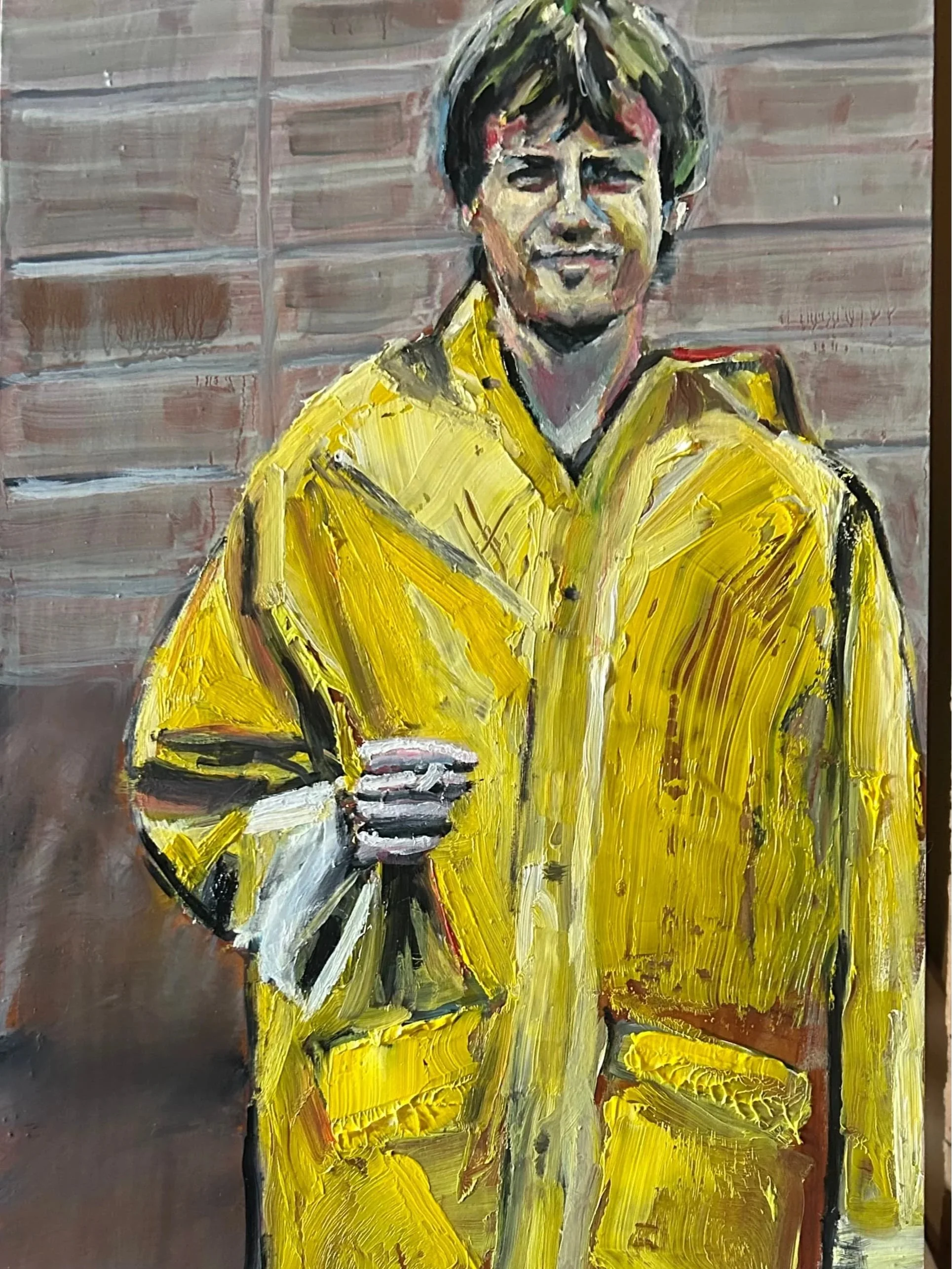 Painting of a man wearing a yellow shirt and holding a glass, standing in front of a brick wall.