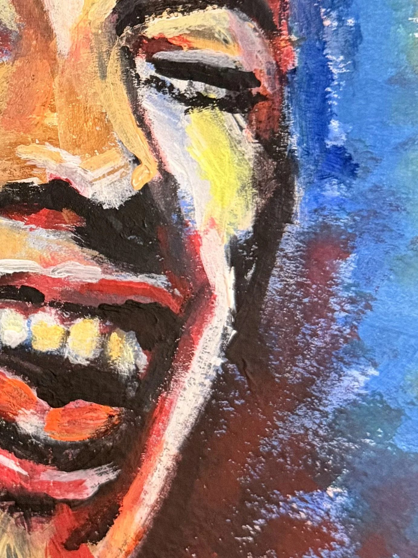 A colorful abstract painting of a face, with prominent red, orange, yellow, black, blue, and white brushstrokes.