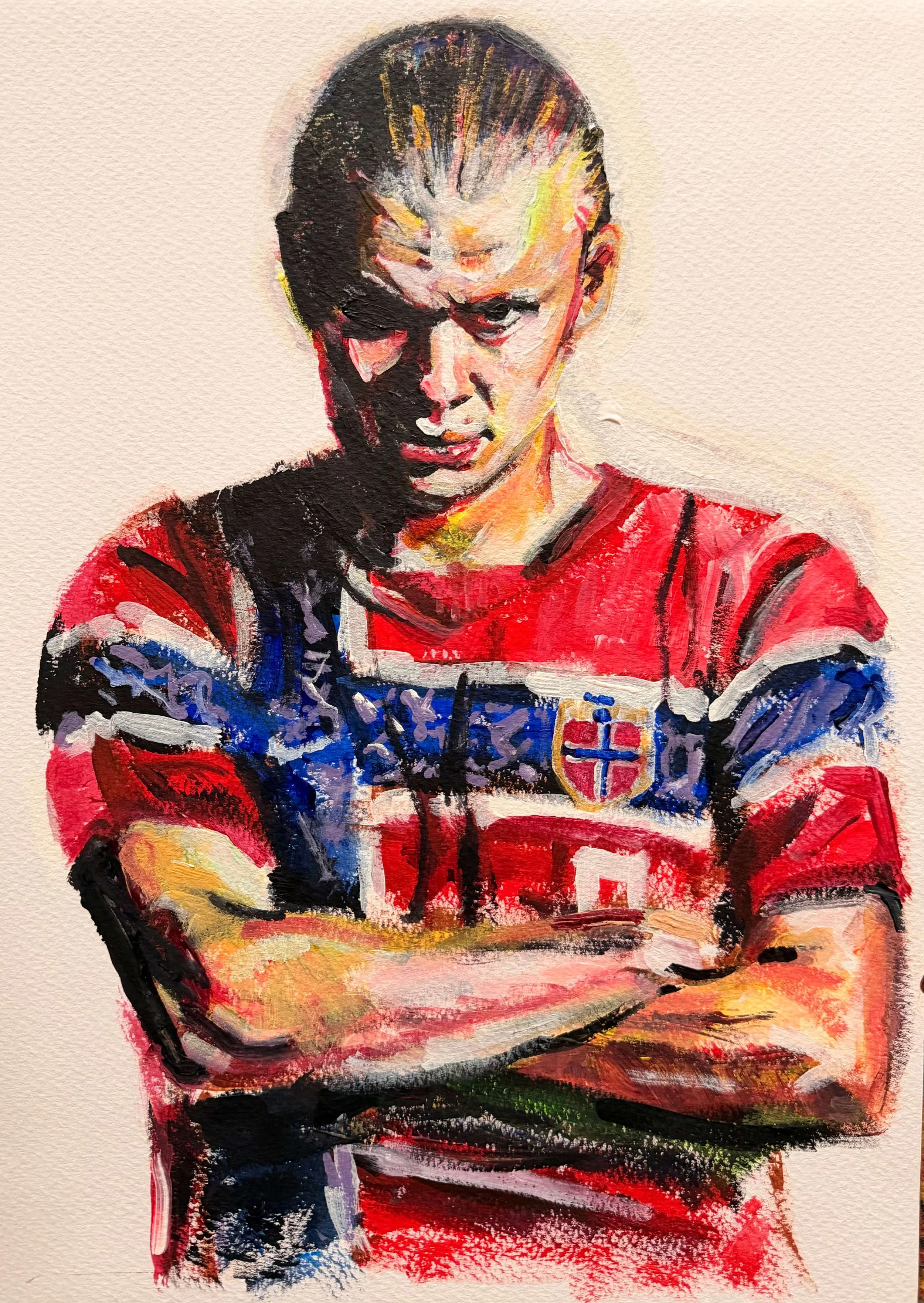 Watercolor painting of a young man with slicked-back hair, wearing a red sports jersey with a crest, looking serious with folded arms.
