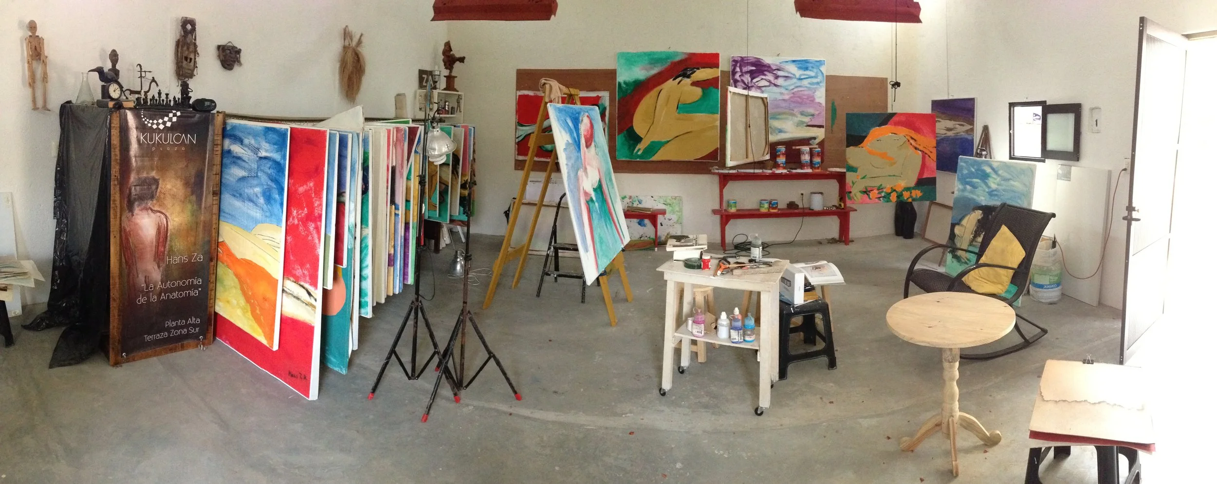 Interior of Hans Zandvoort’s studio in El Jobo, Chiapas, Mexico, with paintings, works in progress and art materials.