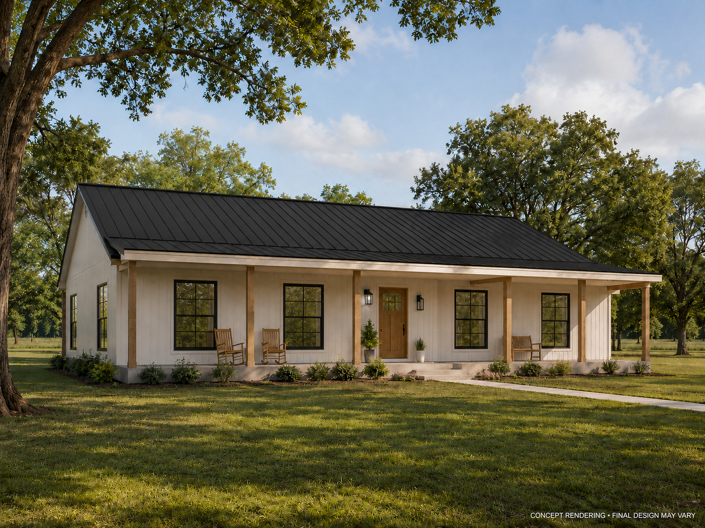 Front view of a modern farmhouse with a black metal roof, white exterior siding, and a small front porch with wooden chairs and potted plants, surrounded by green lawn and trees.