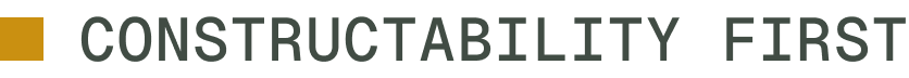 Partial view of a black banner with green text that reads 'CONSTRUCTABILITY FIRST'