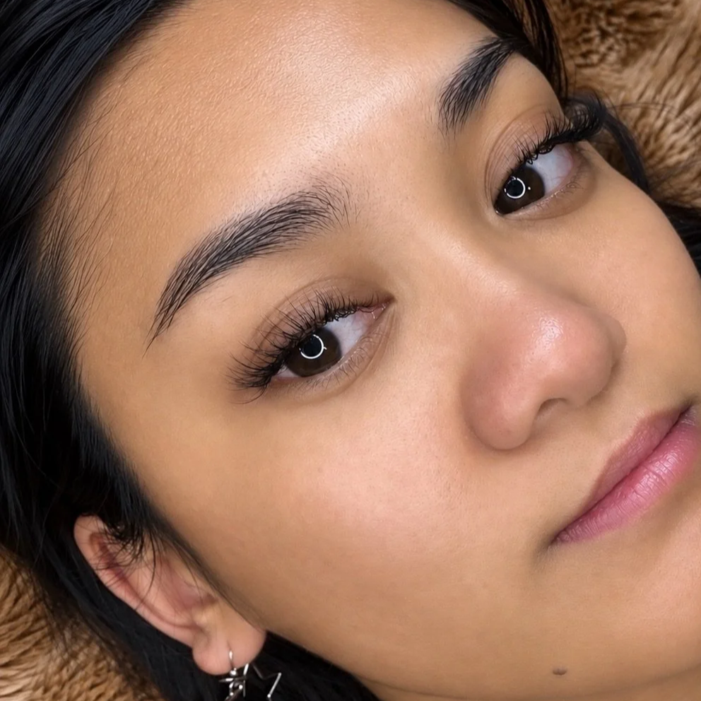     Client wearing customized lash extensions after her appointment at Flaunt & Flutter Lashery in York, PA.