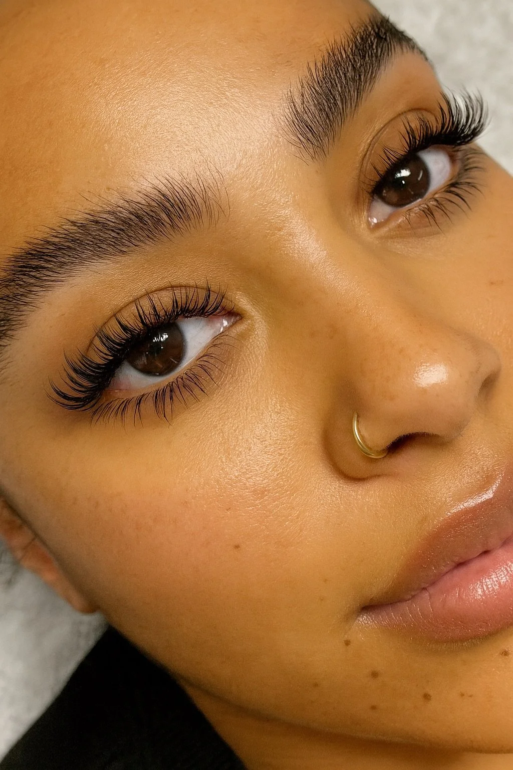     Close-up of wispy lash extensions with soft textured definition by a York, PA lash artist.