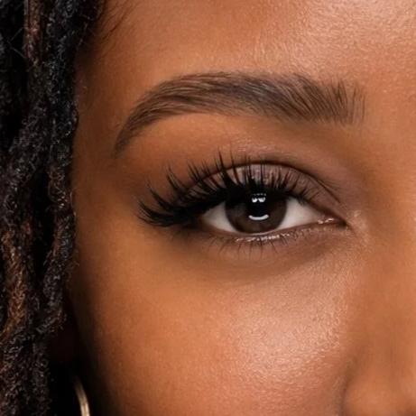     Close-up of custom volume lash extensions with a soft, full finish at Flaunt & Flutter Lashery.