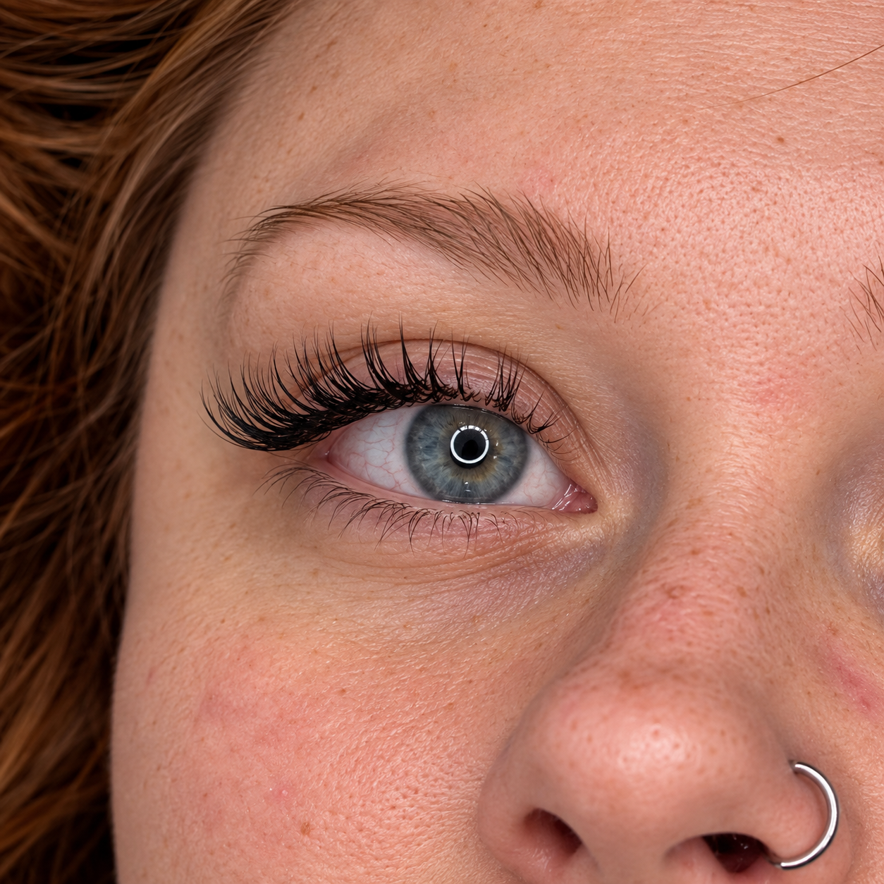     Close-up of custom classic lash extensions by Flaunt & Flutter Lashery in York, PA.