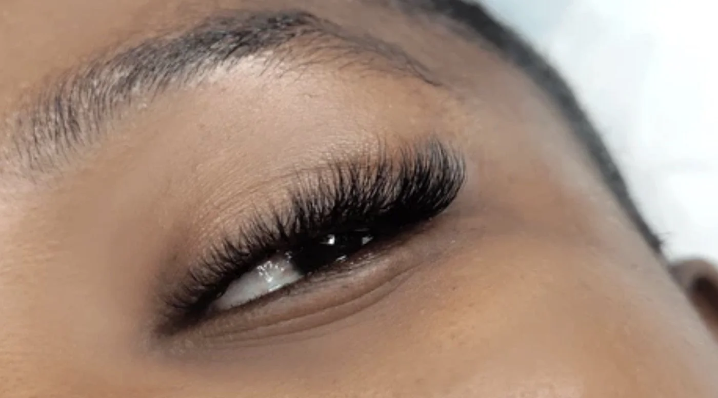     Close-up of custom volume lash extensions with a soft, full finish at Flaunt & Flutter Lashery.