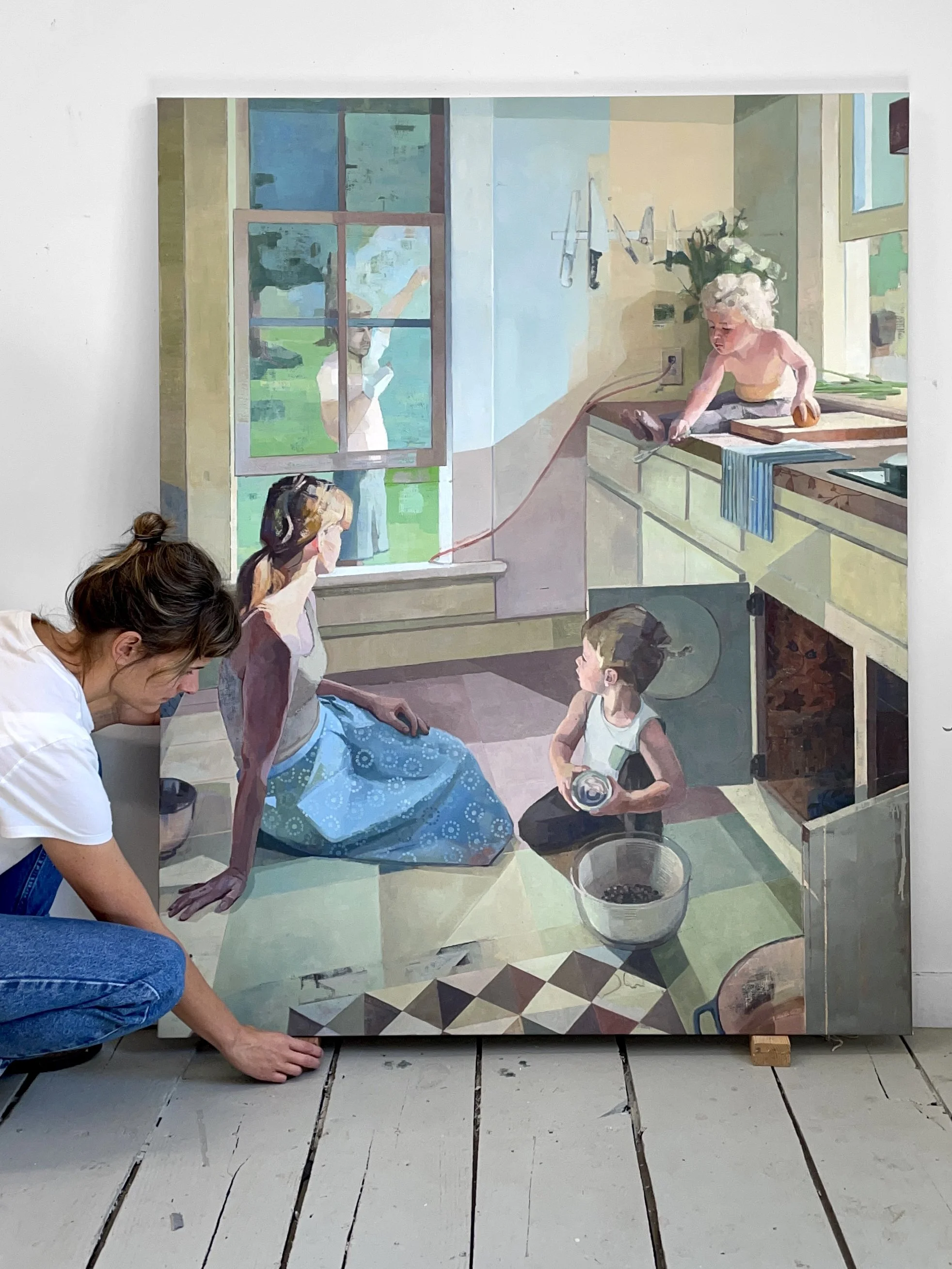 Caitlin Winner beside her painting Is There Anything New? in her studio.