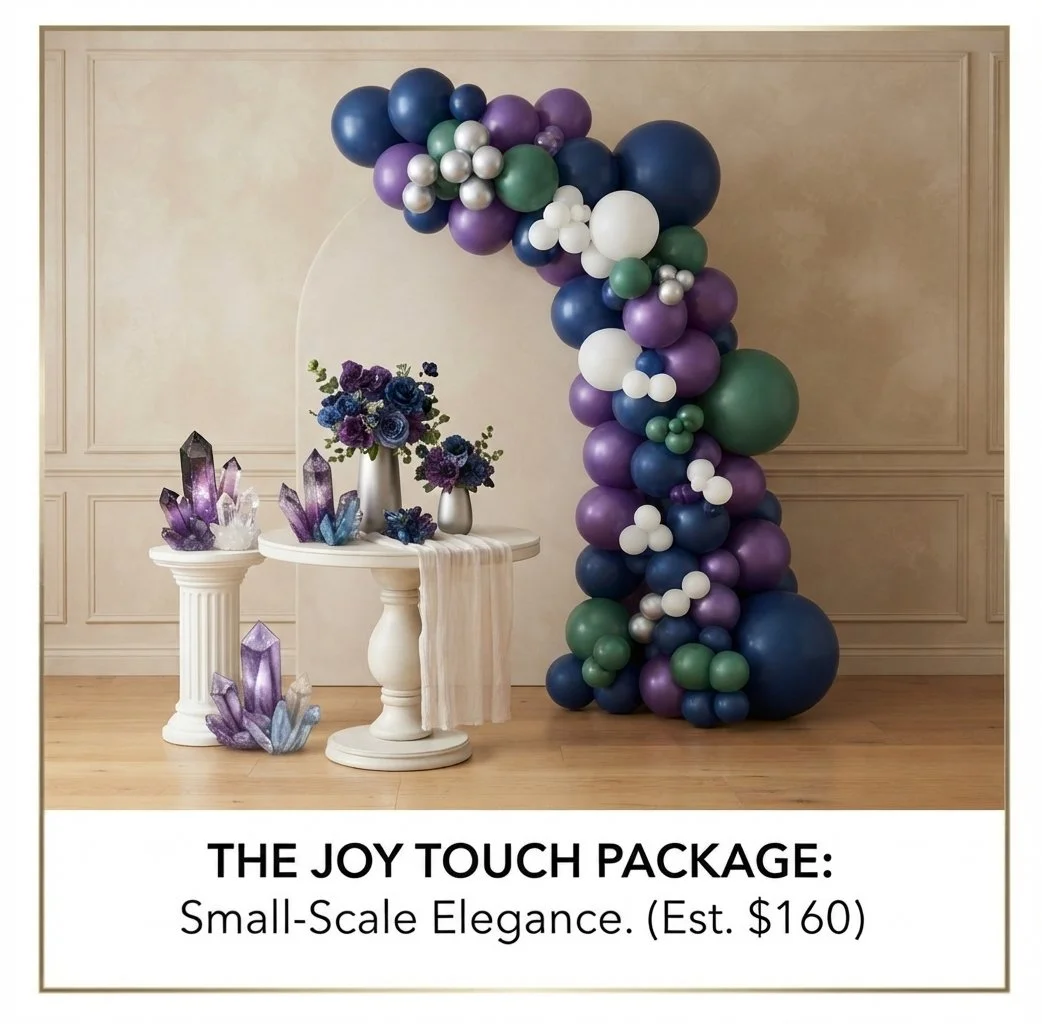 Decorative display with a balloon arch in shades of purple, blue, green, white, and silver, along with a table holding purple floral arrangements and purple and clear crystal-like sculptures, captioned "The Joy Touch Package: Small-Scale Elegance," estimated at $160.
