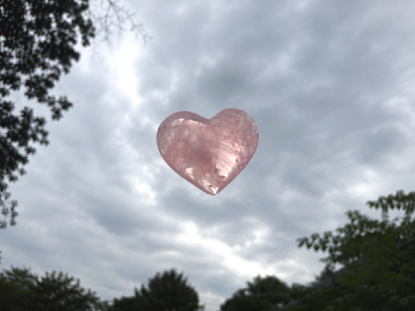 A pink heart-shaped balloon floating in a cloudy sky, with trees at the bottom of the image.