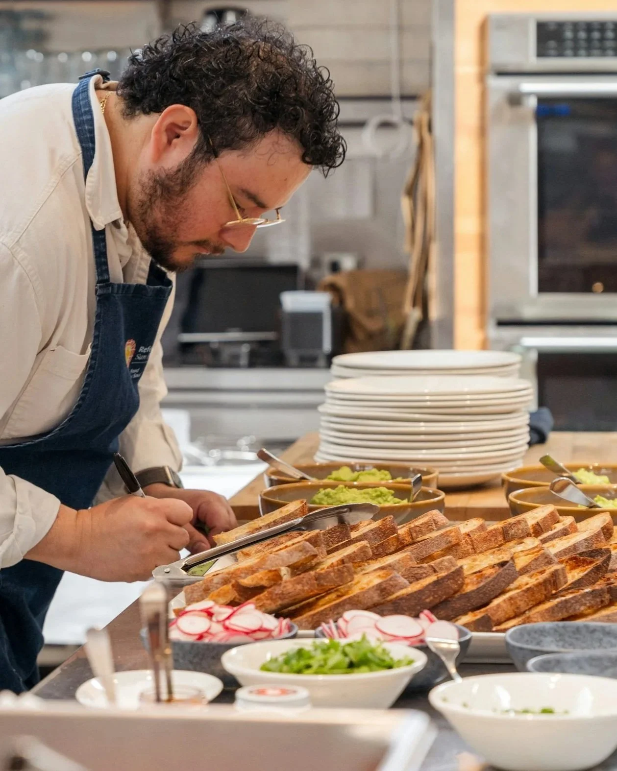 Chef prepping ingredients in restaurant