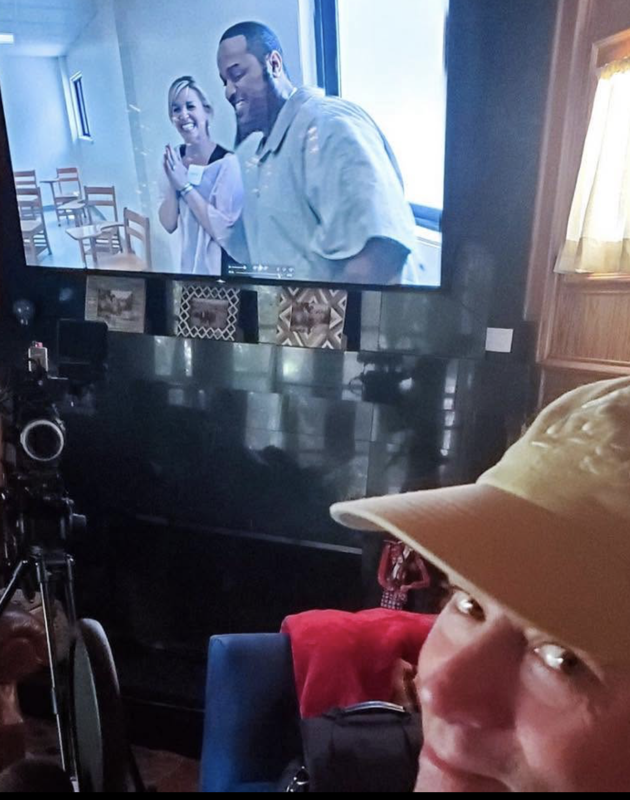 Behind-the-scenes TV image: Behind-the-scenes image from Skipping Joy showing Tim Leuzarder watching film footage on a television monitor.
