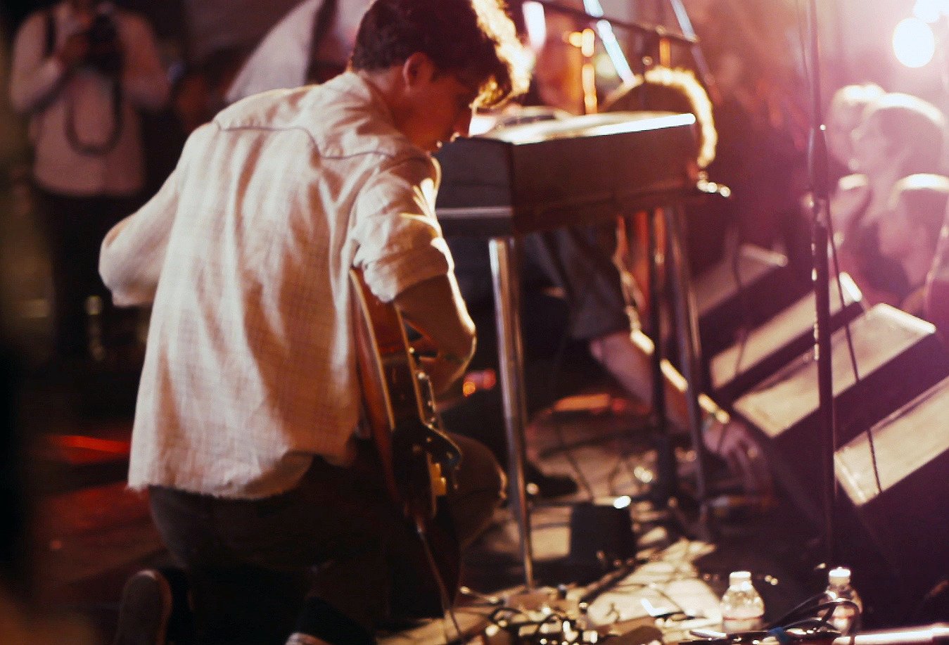 Breaking: Los Angeles documentary still of Chasing Kings' guitarist sound checking onstage pre-show.