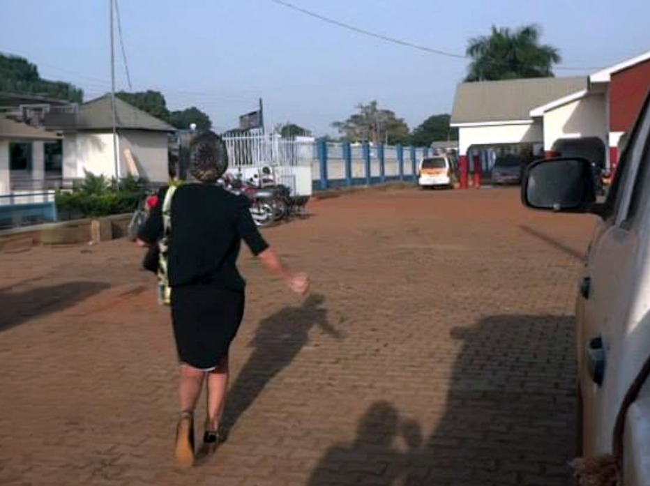 Nurse/Uganda: Nurse skipping down a street in Uganda during filming of the documentary Skipping Joy.