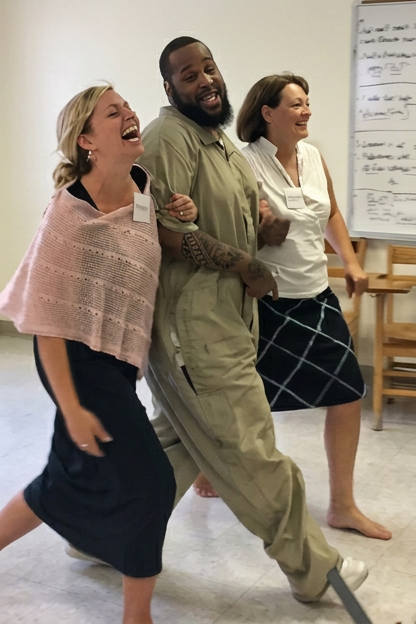 Inmate: Inmate and two women skipping together during the filming of the documentary Skipping Joy.