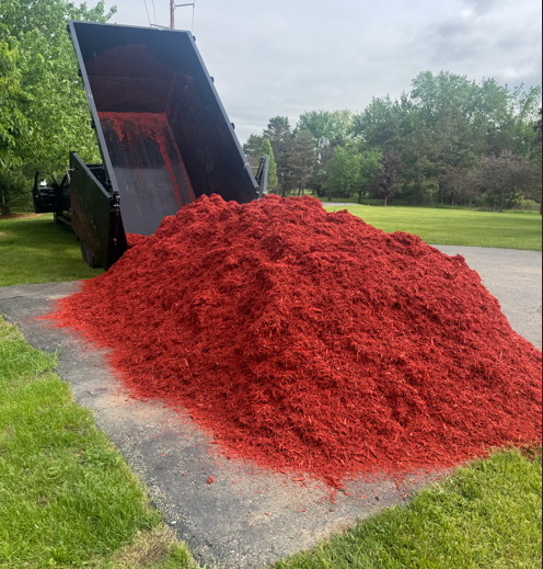 Load of mulch dumped with trailer.png