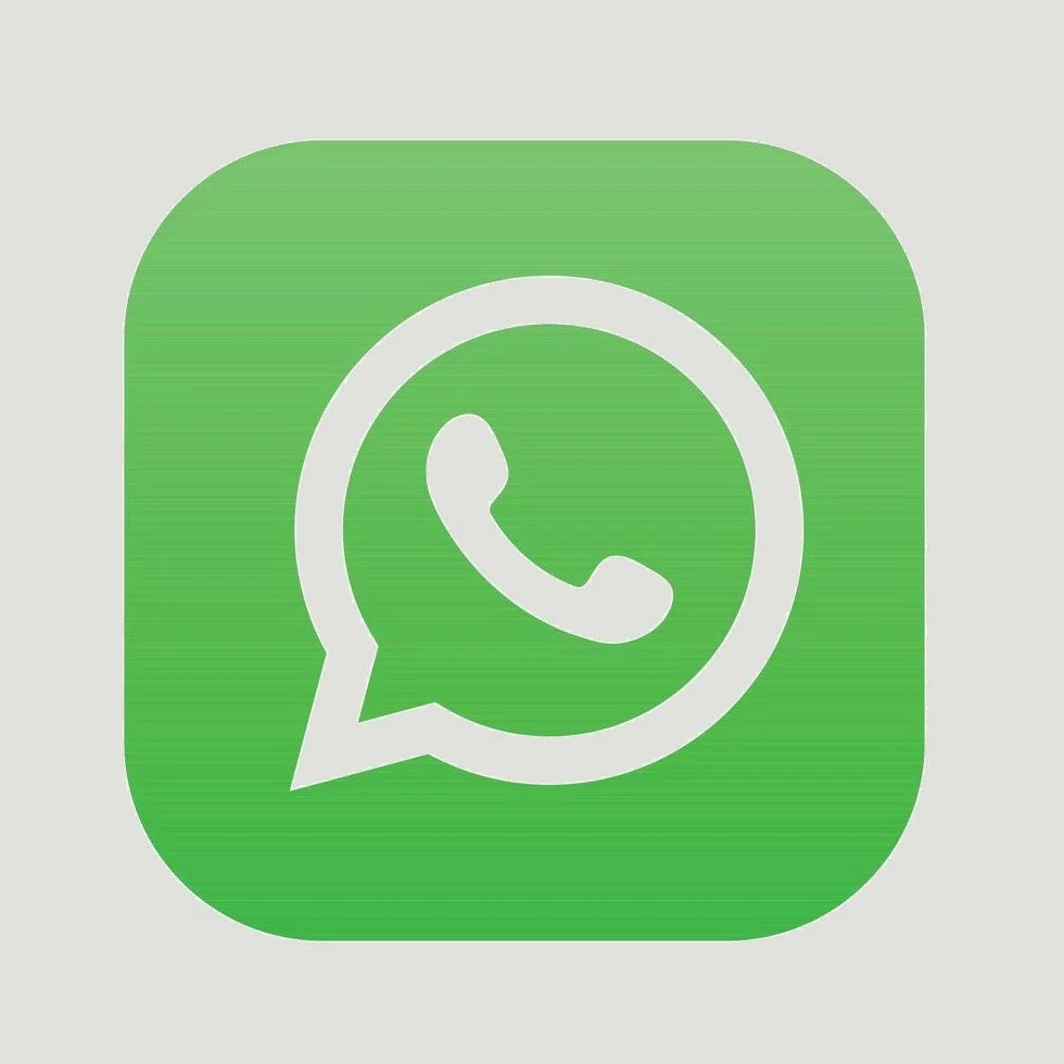 Green icon with a white speech bubble and a telephone receiver inside, representing WhatsApp.