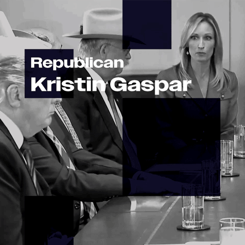 Trump and others sitting at a conference table, with Kristin Gaspar sitting on the right side, during a discussion or meeting.