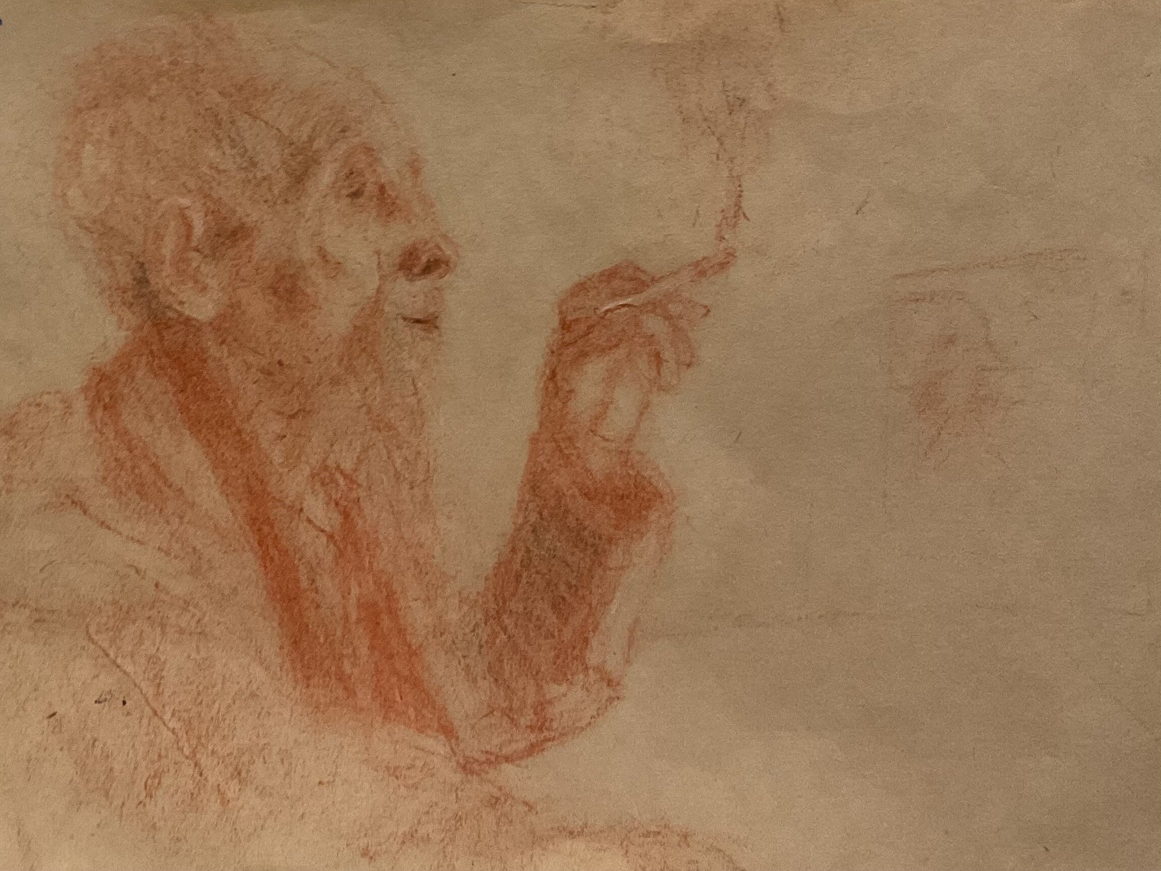 A faint red pencil sketch of a smiling woman with wavy hair, holding a flower, on beige paper.
