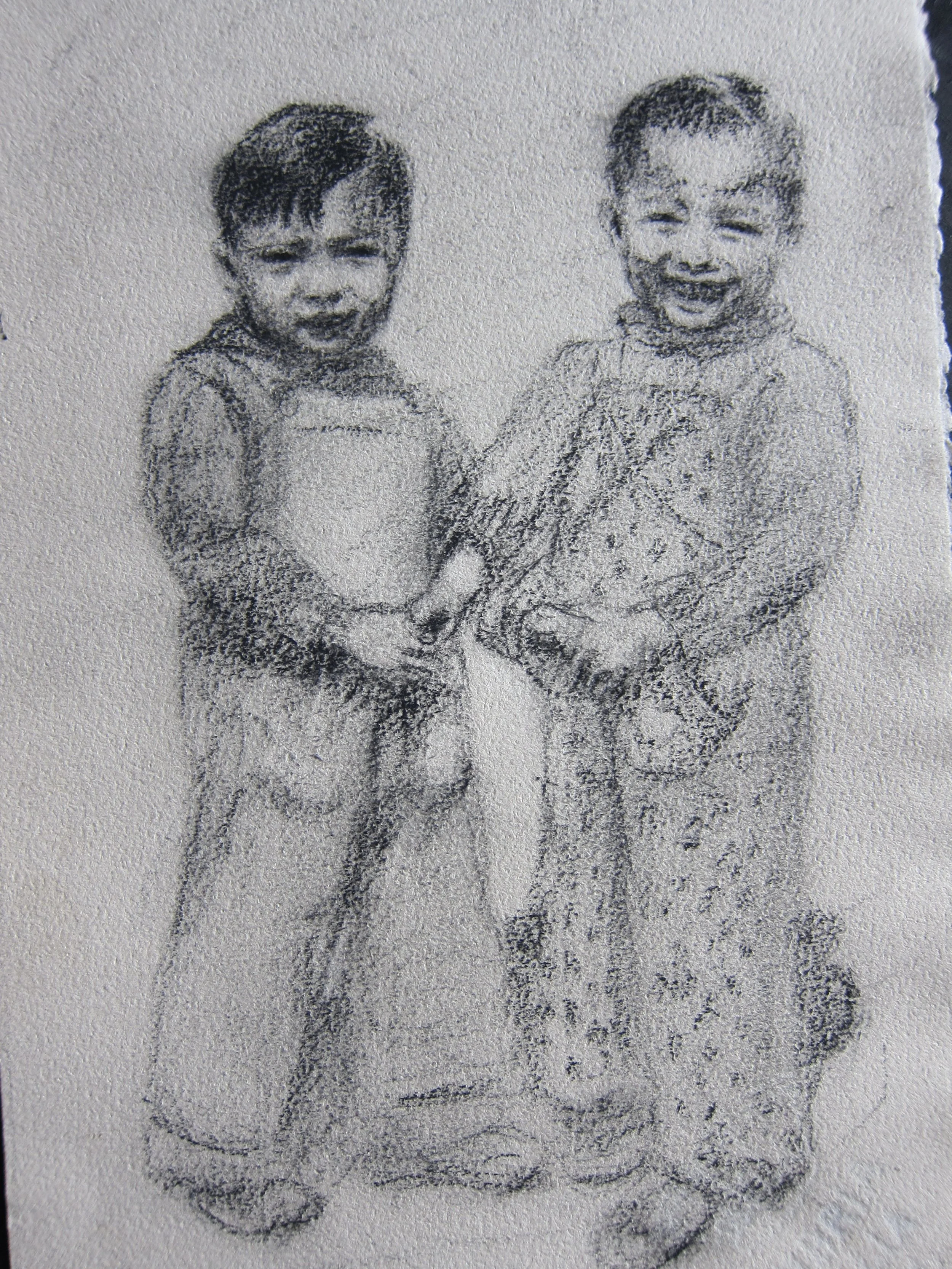 Black and white sketch of two smiling children, a girl and a boy, standing close together and holding hands on textured paper.