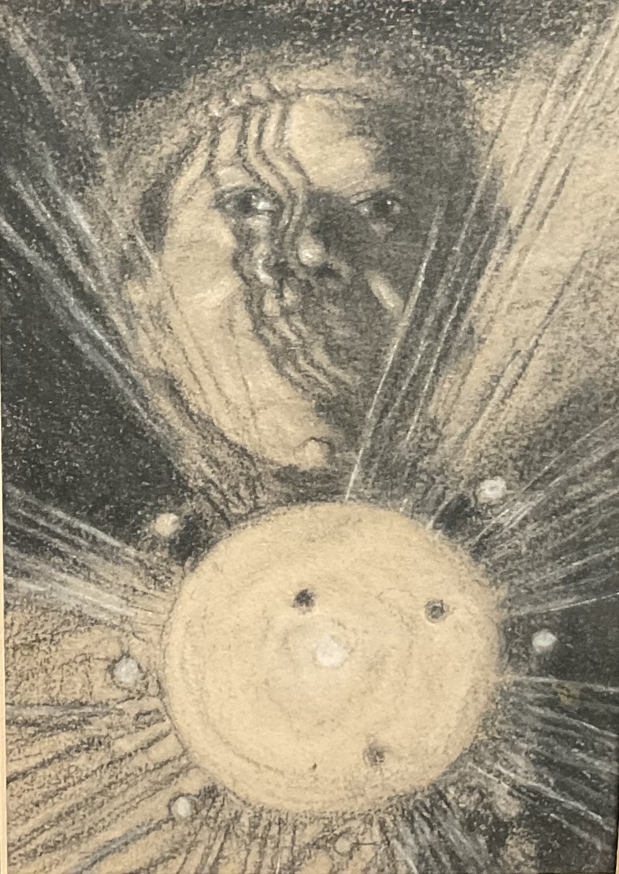 A religious icon painted on a ceiling, depicting Jesus Christ with a halo and sacred symbols around him.