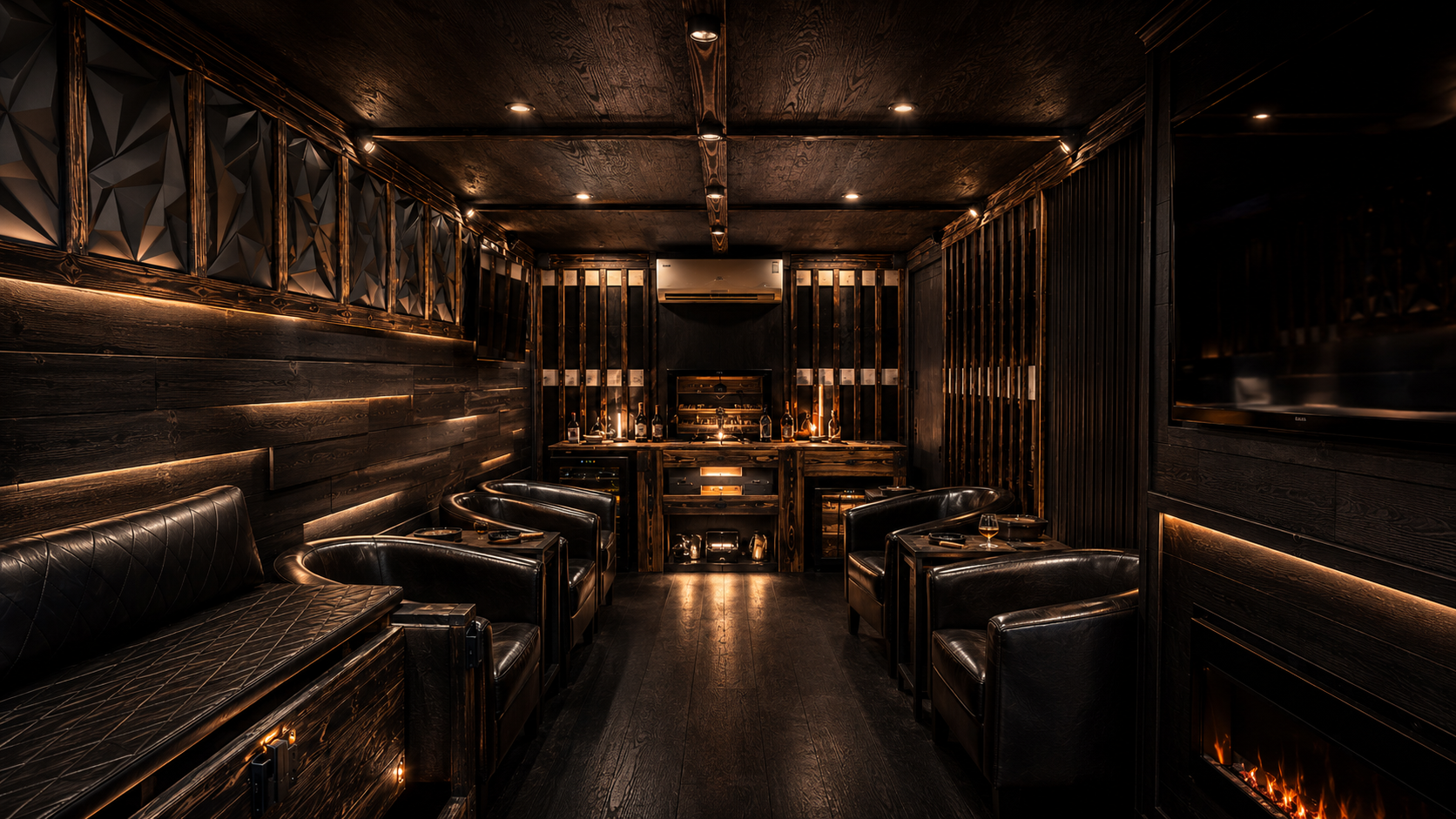 A luxury dimly-lit lounge with black leather armchairs, wooden walls, and a fireplace, featuring a bar area with bottles and glasses.