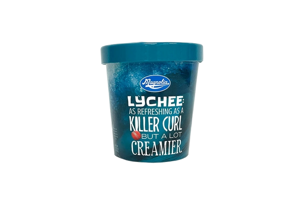 A container of Magnolia Lychee ice cream, describing it as refreshing and creamy, with a playful quote on the label.