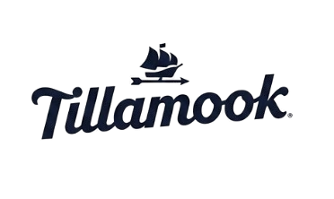 Tillamook logo with a whale and sailing ship illustration