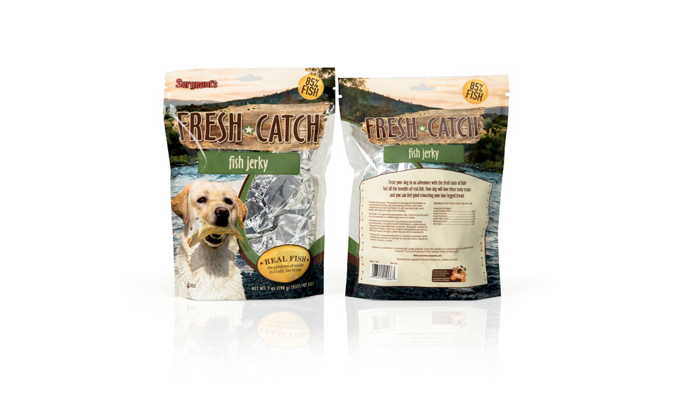 Front and back of a bag of Fresh Catch fish jerky for dogs, featuring a golden retriever holding the jerky in its mouth, with a river and trees in the background.